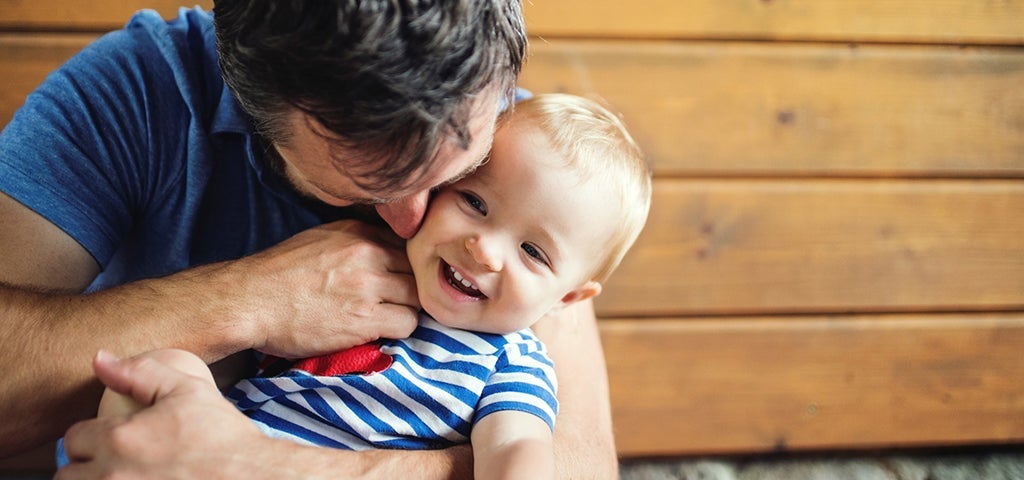 Father and son hugging photo