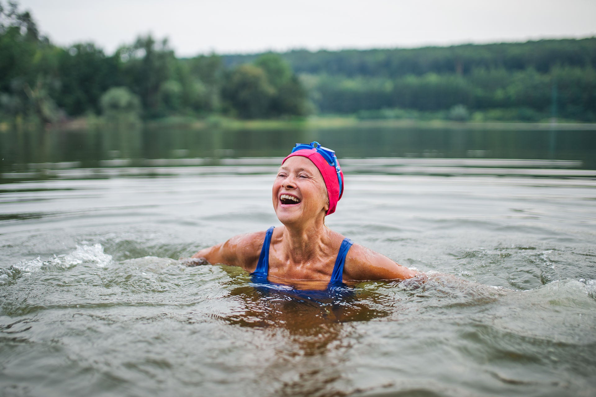the woman swimming in the lake